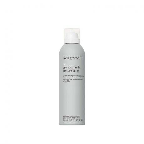 Une bouteille de laque grise du Living Proof Full Dry Volume & Texture Spray sur fond blanc