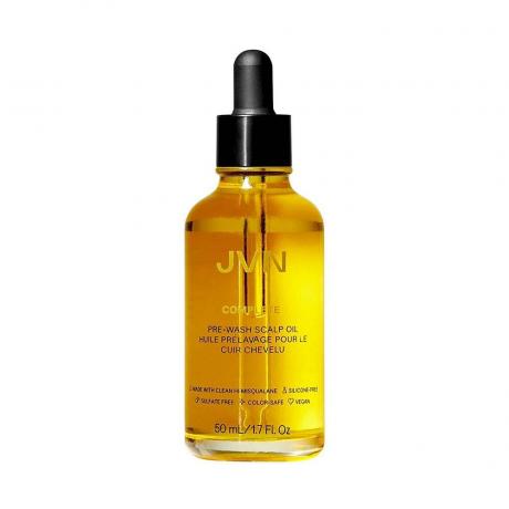 Žlutá lahvička s kapátkem JVN Complete Pre-Wash Scalp & Hair Treatment Oil na bílém pozadí