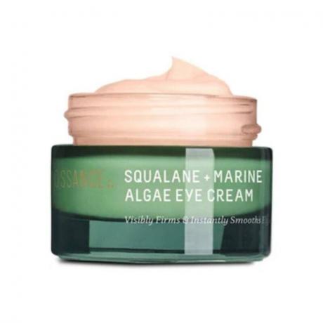 En grøn krukke med Biossance Squalane + Marine Algae Eye Cream på en hvid baggrund
