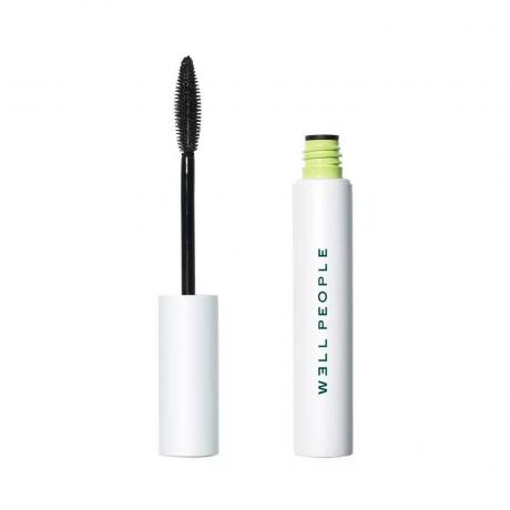 W3ll People Expressionist Pro Mascara λευκό σωληνάριο με λάιμ πράσινο επάνω μέρος και λευκό ραβδί στο πλάι σε λευκό φόντο
