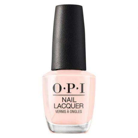 OPI Nail Lacquer in Bubble Bath пляшка блідо-рожевого лаку для нігтів з чорною кришкою на білому тлі