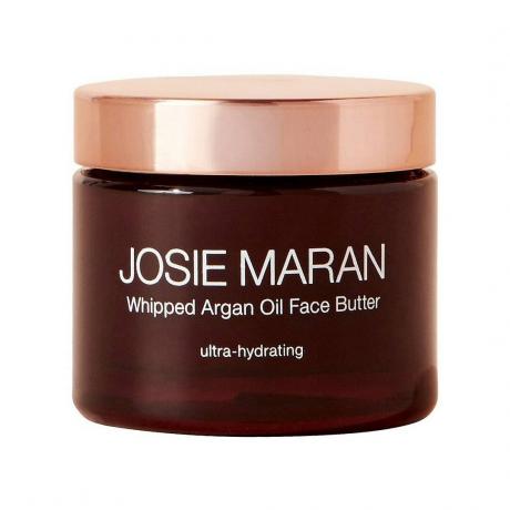 Mantequilla facial de aceite de argán batida Josie Maran sobre fondo blanco