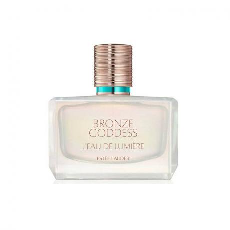 Woda perfumowana Estée Lauder Bronze Goddess L'Eau de Lumiere: Kwadratowa butelka perfum ze złotą zakrętką na białym tle