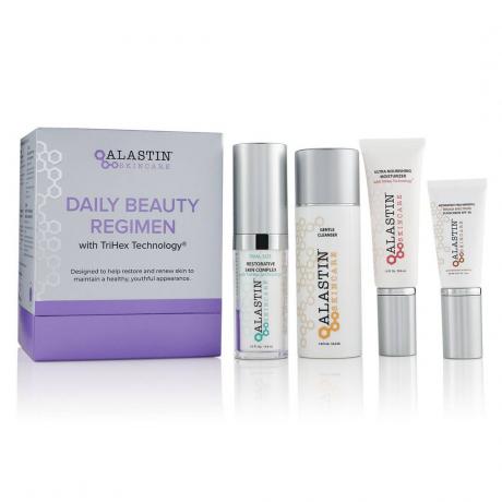 Alastin Daily Beauty Regimen quatro produtos brancos para cuidados com a pele e caixa cinza em fundo branco