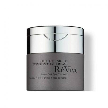 RéVive Perfectif Night Night Tone Cream: Ένα γκρι βάζο με ασημί καπάκι και μαύρο κείμενο σε λευκό φόντο