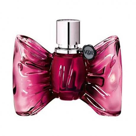 Bonbon Eau de Parfum bottiglia di profumo a forma di fiocco rosa caldo su sfondo bianco