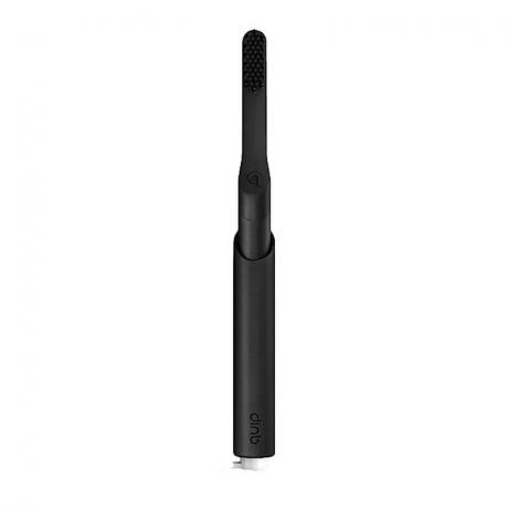 Quip Rechargeable Smart Brush berwarna hitam dengan latar belakang putih