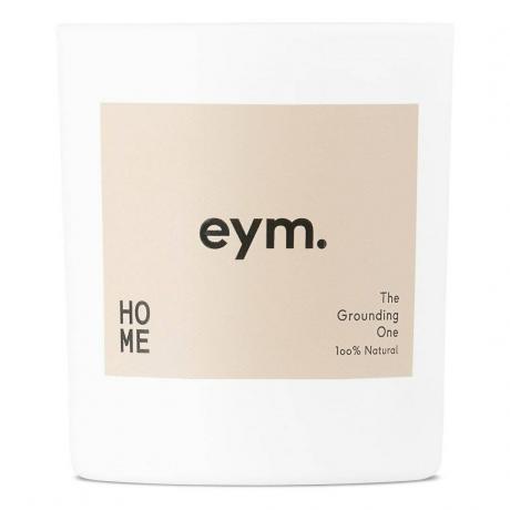 Bougie blanche standard à mèche unique Eym Naturals avec étiquette beige sur fond blanc