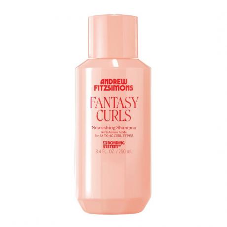 розова бутилка подхранващ шампоан Andrew Fitzsimons Fantasy Curls с червени букви на бял фон