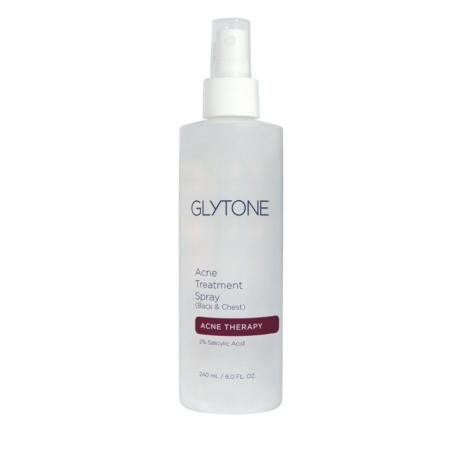 Spray de tratament pentru acnee Glytone Spate și piept pe fundal alb 