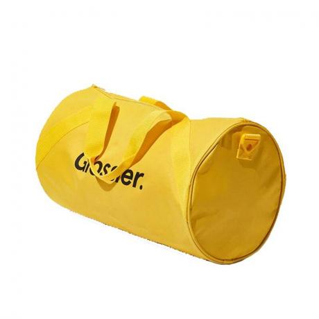 Glossier Sunshine Yellow Duffel Bag valgel taustal