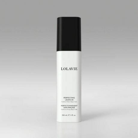 Lolavie Perfecting Leave-In Conditioner flacon blanc avec bouchon noir sur fond gris
