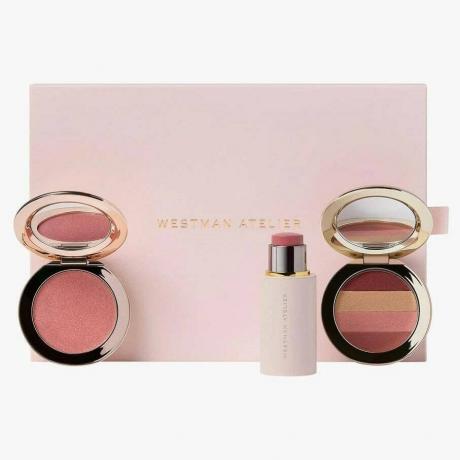 Westman Atelier The Getaway Edition Set scatola rosa, due blush e stick girevole su sfondo bianco sporco