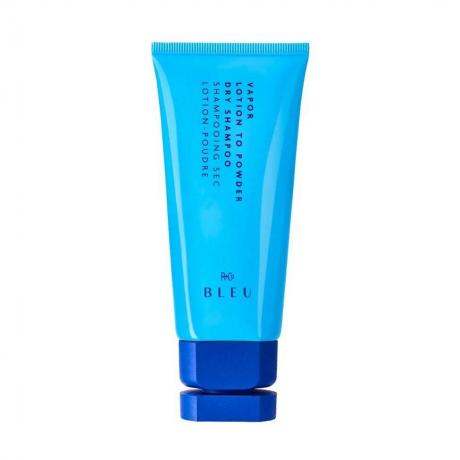 R+Co Bleu Vapor Lotion to Powder Dry Shampoo tubo azul sobre fundo branco