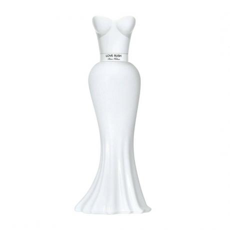 Flakón parfému Love Rush by Paris Hilton v tvare bielych šiat bez rukávov na bielom pozadí
