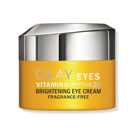 Een kleine oranje en zilveren pot Olay Vitamine C + Peptide 24 Eye Cream op witte achtergrond