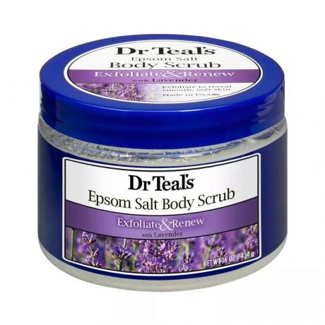 Dr. Teal's Exfoliate & Renew Lavender Epsom Salt Body Scrub син буркан с лавандула върху него на бял фон