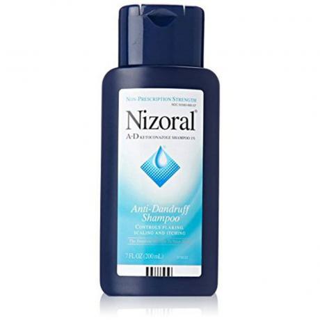 Nizoral šampūnas nuo pleiskanų baltame fone
