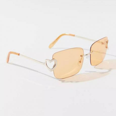 Urban Outfitters Heartbreaker Rimless kvadratiniai akiniai nuo saulės baltame fone