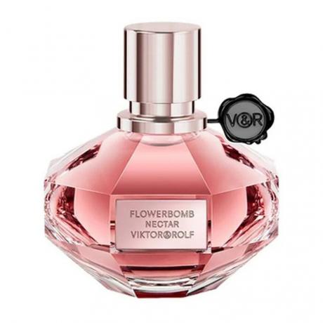 Flowerbomb Nectar Eau de Parfum knäböj granatformad flaska med rosa parfym på vit bakgrund