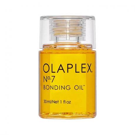 Διαφανές μπουκάλι Olaplex No.7 Bonding Oil με κίτρινο λάδι σε λευκό φόντο