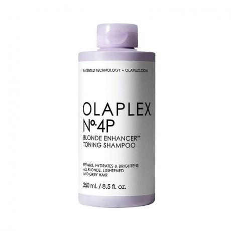 Olaplex No.4P Blonde Enhancer Toning Shampoo: Ένα μωβ μπουκάλι σαμπουάν με λευκή ετικέτα και μαύρο κείμενο σε λευκό φόντο