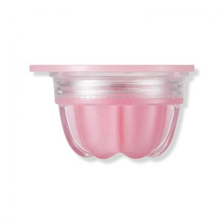 Tonymoly Jelly Lip Melt Treatment: Ein klares kleines Glas, gefüllt mit einem rosa Lippenbalsam auf weißem Hintergrund