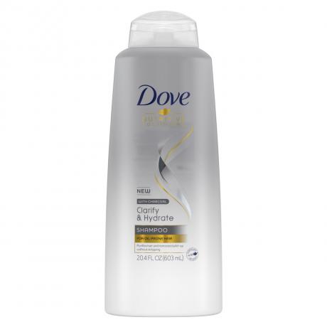 frasco de Dove Nutritive Solutions Shampoo Clarify & Hydrate em um fundo branco
