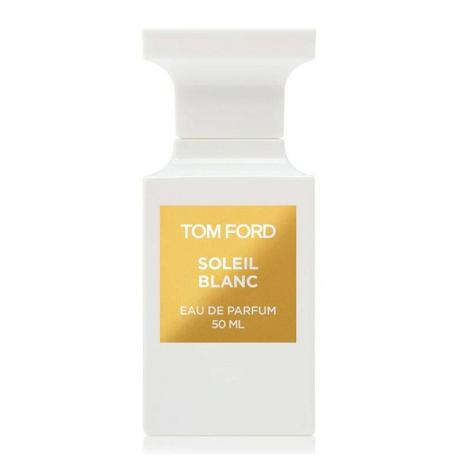Balta smaržu pudelīte ar Tom Ford Soleil Blanc Eau de Parfum Spray zelta etiķeti uz balta fona