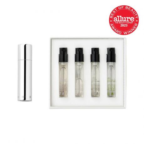 Aeir Mini Discovery Set patru mini atomizoare de parfum în cutie albă și recipient metalic de călătorie pe fundal alb cu sigiliu roșu Allure BoB în colțul din dreapta sus