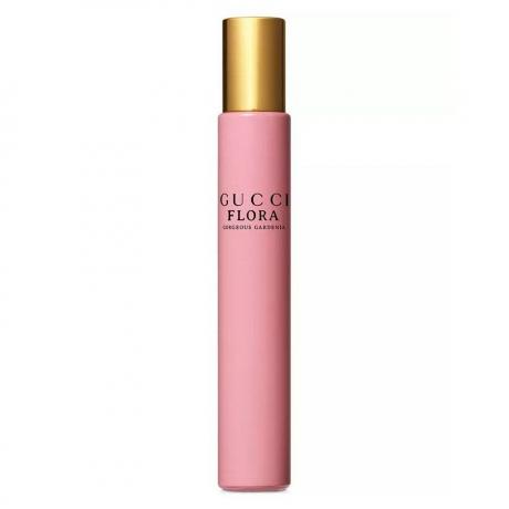 Gucci Flora Gorgeous Gardenia Eau de Parfum Rollerball pinkki matkakokoinen hajuvesipullo kultaisella korkilla valkoisella pohjalla