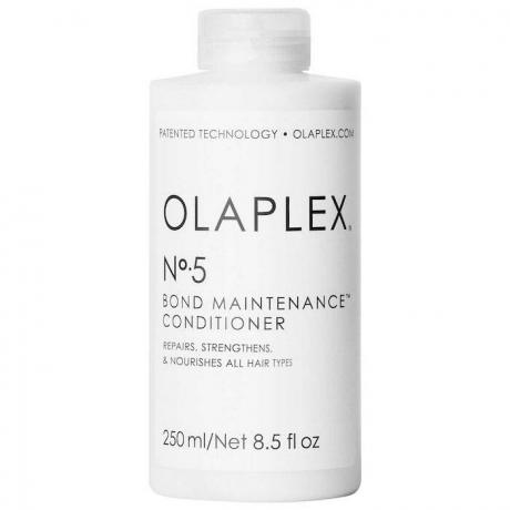 steklenica Olaplex No 5 Bond Maintenance Conditioner na belem ozadju