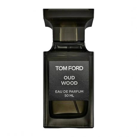 Tom Ford Oud Wood tumši olīvzaļa smaržu pudele uz balta fona
