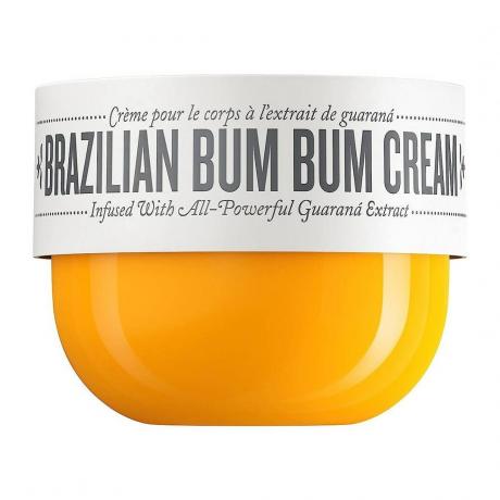 Sol de Janeiro Brazilian Bum Bum Cream oranža burka ar baltu vāku uz balta fona