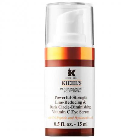 Kiehl's Powerful Strength Dark Circle Reducing Vitamin C Eye Serum contenitore arancione tozzo con etichetta bianca e tappo della pompa su sfondo bianco
