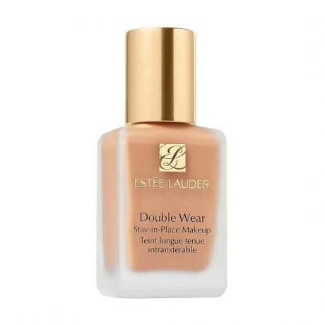 Estée Lauder Double Wear Stay-In-Place Makeup каламутна пляшка тонального крему з тонкою золотою кришкою на білому тлі
