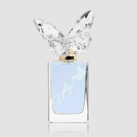 Dolly's Front Porch Collection pravokotna steklenička pastelno modrega parfuma Early Morning Breeze s kristalnim metuljastim pokrovčkom na sivem ozadju