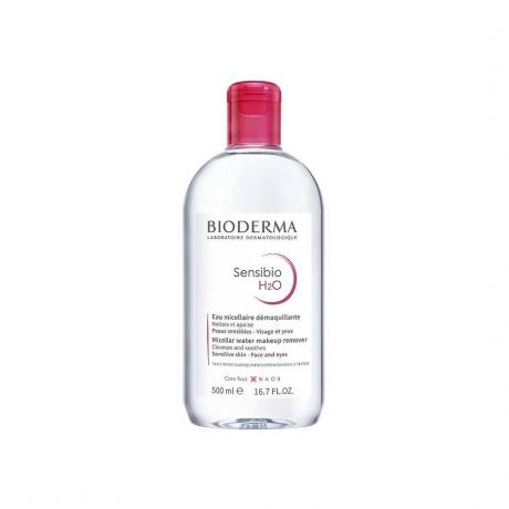 Bioderma Sensibio H2O Solução de remoção de maquiagem frasco transparente com tampa rosa sobre fundo branco