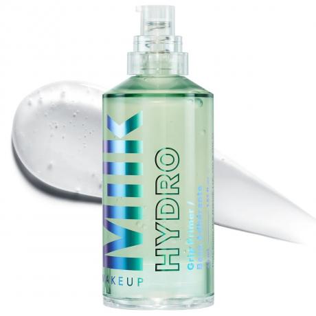 Mléčný make-up Hydro Grip Primer lahvička světle zeleného primeru na bílém pozadí
