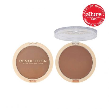 Makeup Revolution Ultra Cream Bronzer okrogel kompakten kremni bronzer na belem ozadju z rdečim pečatom Allure BoB v zgornjem desnem kotu